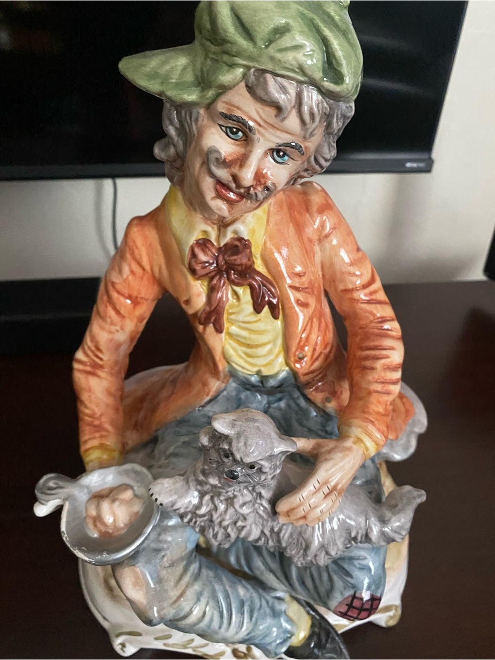 Hand-Painted Porcelain Figurine in Orange, Green and Yellow